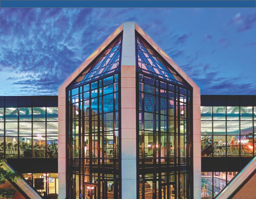 the exterior of the life time eagan club at dusk